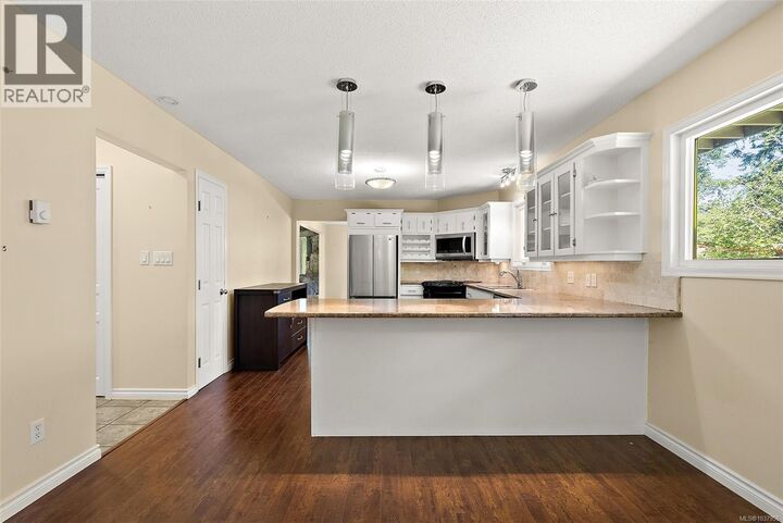 Property Photo:  1094 Sluggett Road  BC V8M 1J1 
