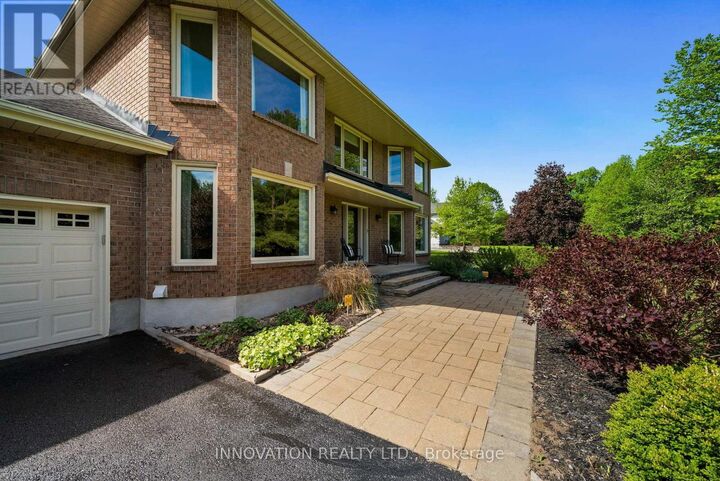 Property Photo: 1410 Sherruby Way ON K2W 1B1