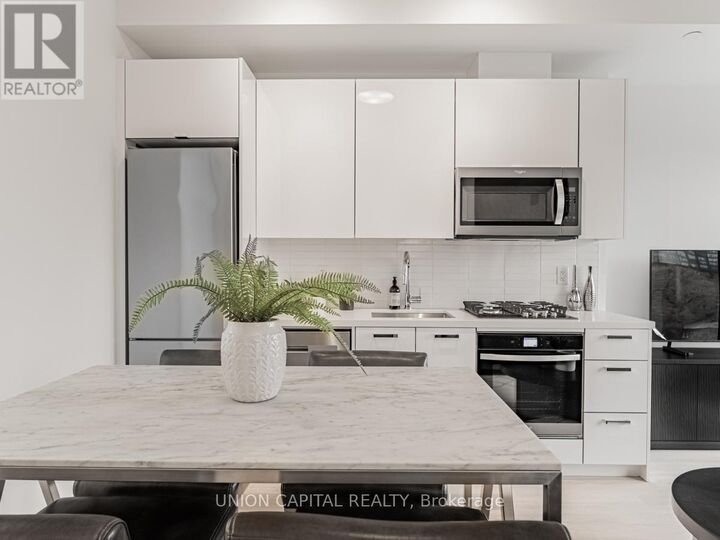 Property Photo: 195 McCaul Street 701 ON M5T 1W6