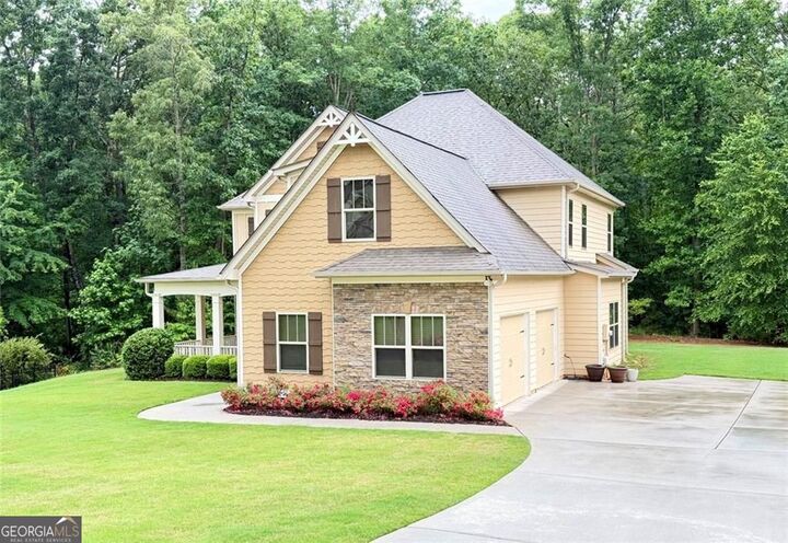 Property Photo:  6169 Clear Brook Pass  GA 30135 