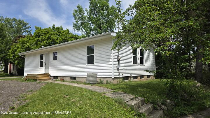 Property Photo:  825 Dunlap Street  MI 48910 