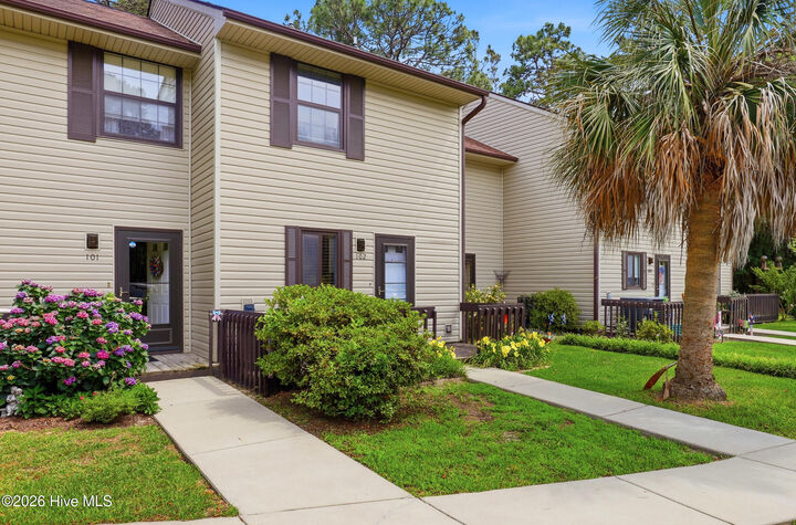 Property Photo:  102 Country Club Villa Drive  NC 28470 
