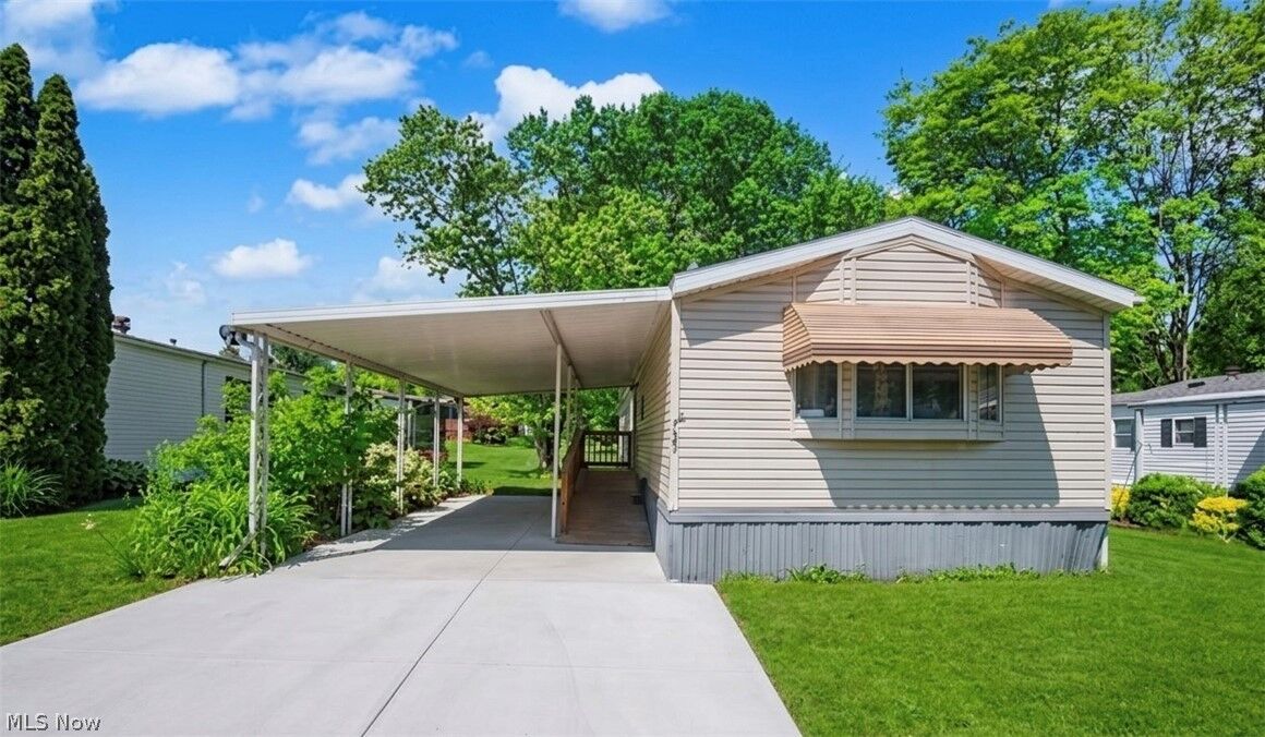 Property Photo: 723 Country Pines Drive SW OH 44481