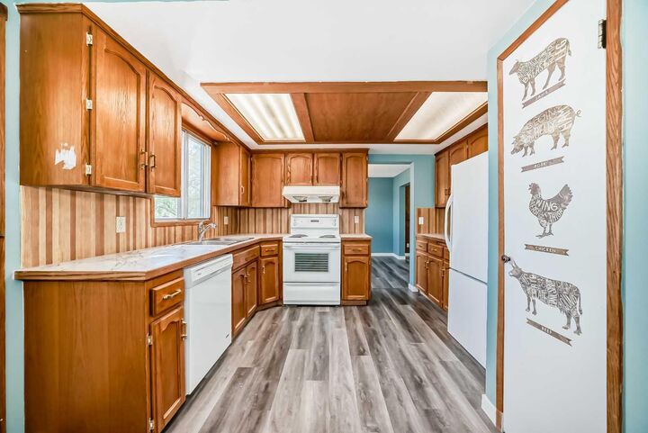 Property Photo: 4308 55 Street NE AB T1Y 4B7