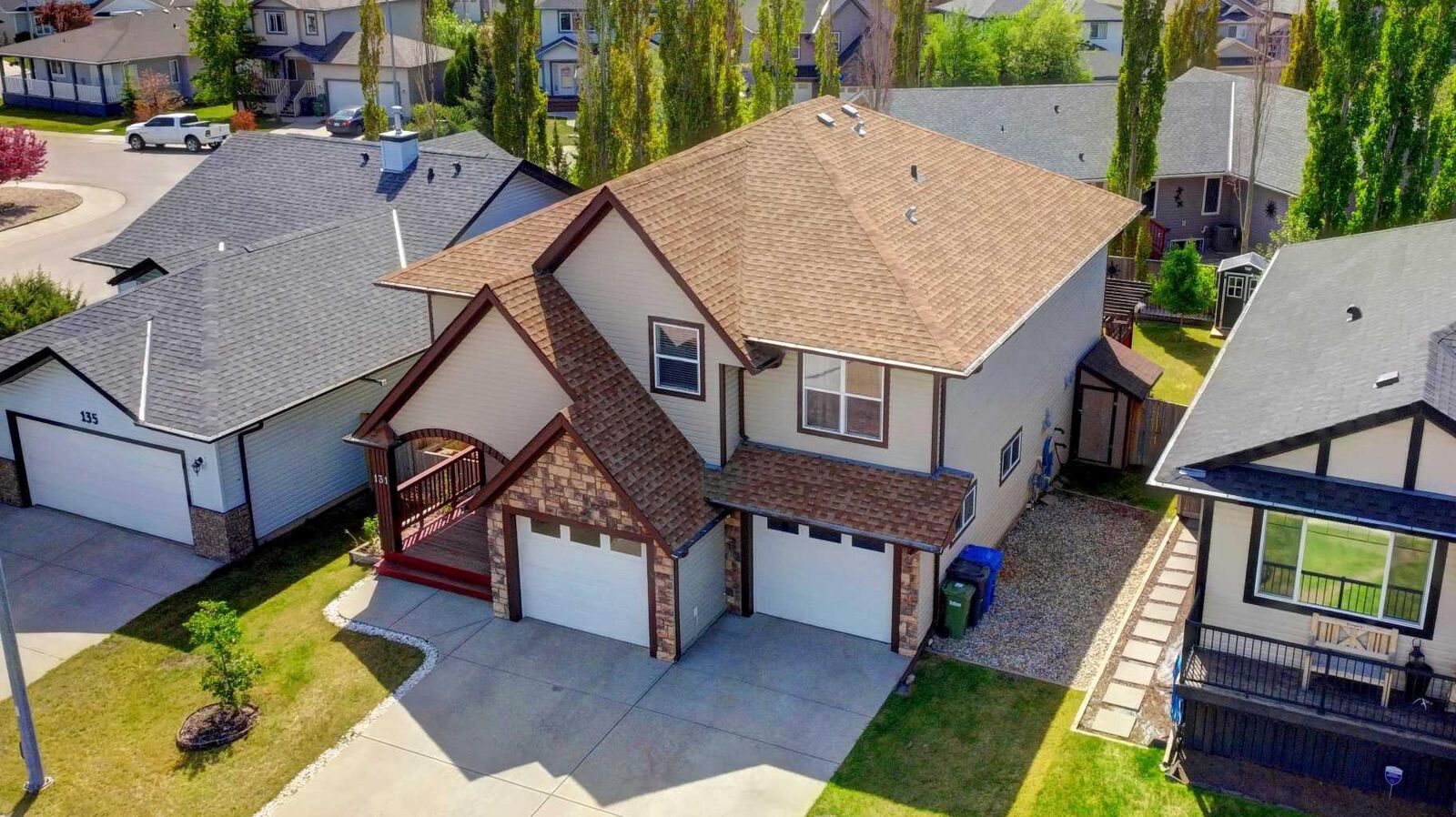 Property Photo: 131 Aspen Creek Way AB T1P 1R4