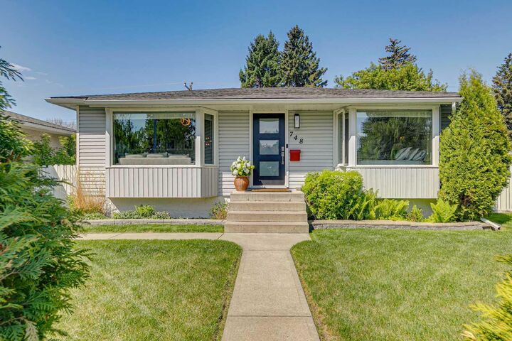 Property Photo: 748 Archwood Road SE AB T2J 1C2