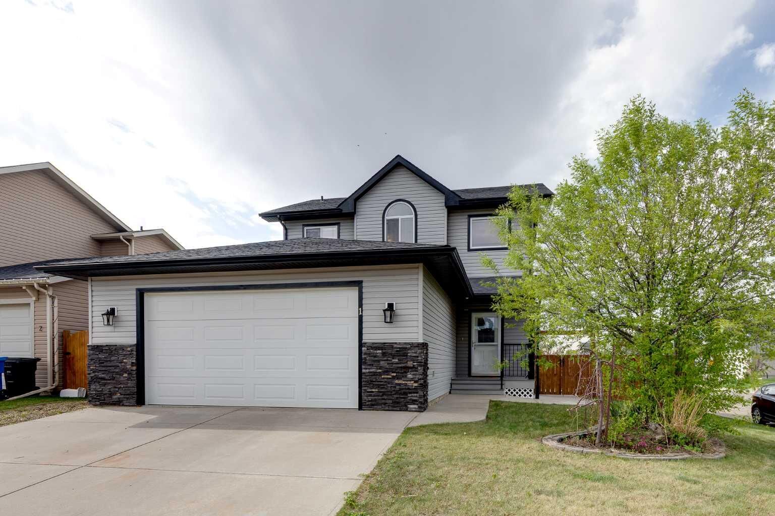 Property Photo:  1 McClung Gate E  AB T0M 0N0 
