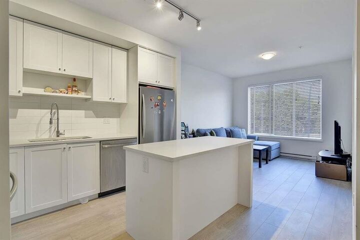 Property Photo: 13623 81A Avenue 206 BC V3W 3N7