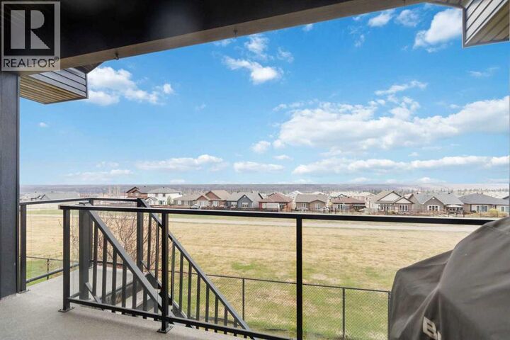 Property Photo:  208 Sparrow Hawk Drive  AB T9K 0Y8 