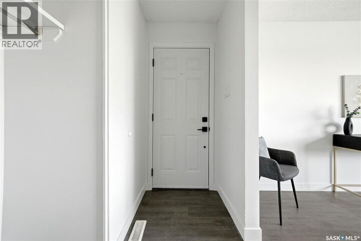 Property Photo: 127 Mackenzie Way SK S4N 5M9