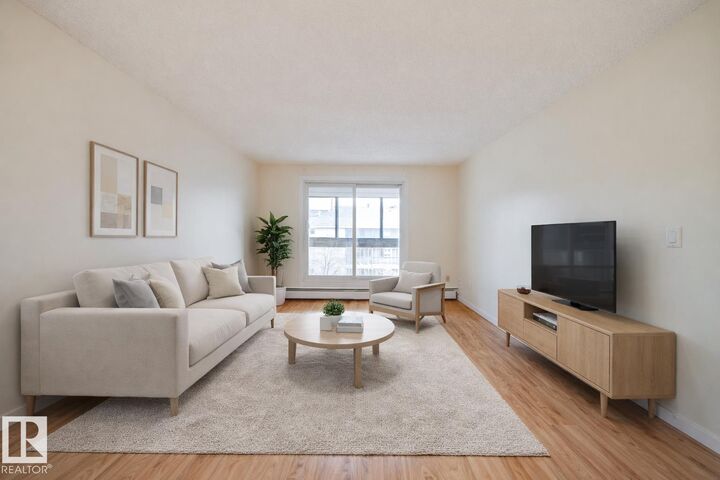 Property Photo:  1624 48 Street NW 402  AB T6L 5P1 