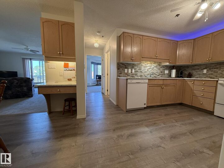 Property Photo: 10903 21 Avenue NW 102 AB T6J 7A4