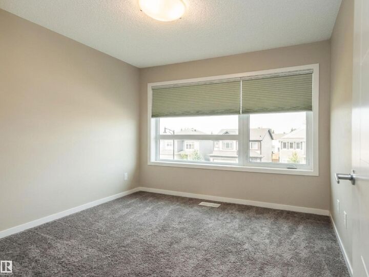 Property Photo: 17263 9 Avenue SW AB T6W 3V4