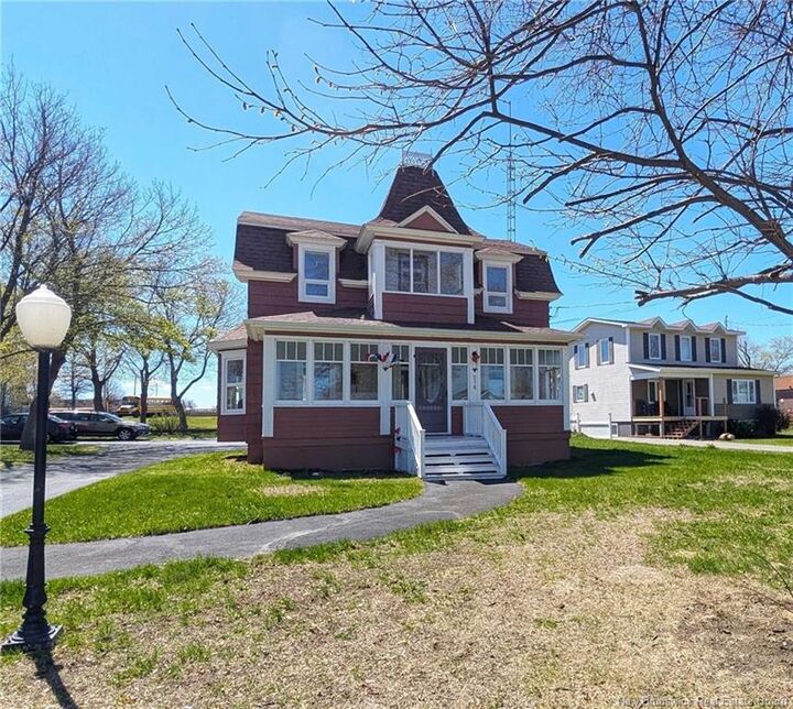 Property Photo: 216 Boul. Saint-Pierre O NB E1W 1A5