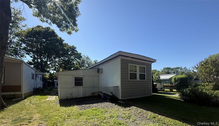 Property Photo:  18 Periwinkle  NY 11716 