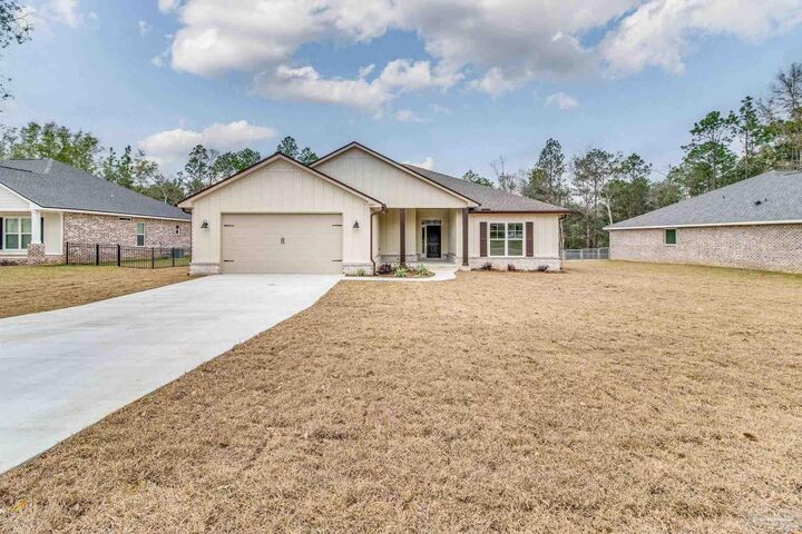 Property Photo:  4298 Watkins St  FL 32571 