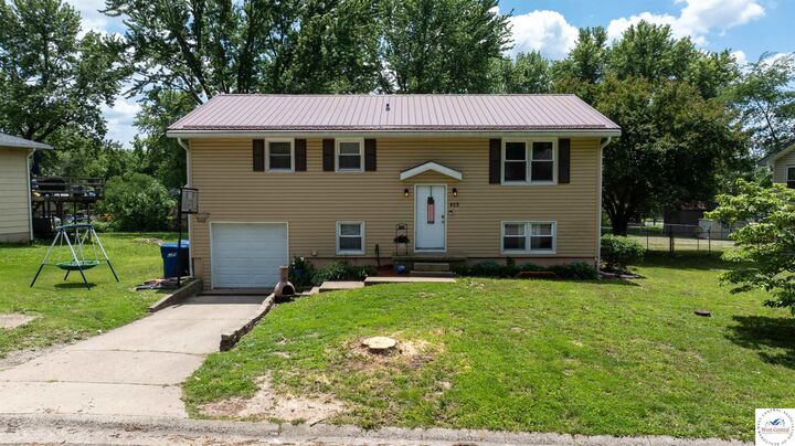Property Photo:  403 E Webster  MO 65350 
