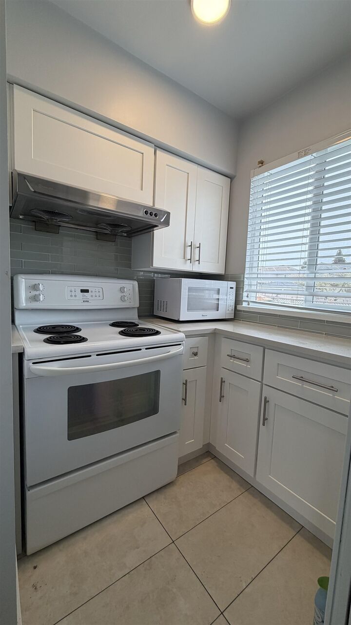 Property Photo:  11647 81A Avenue Main House  BC V4C 2A8 