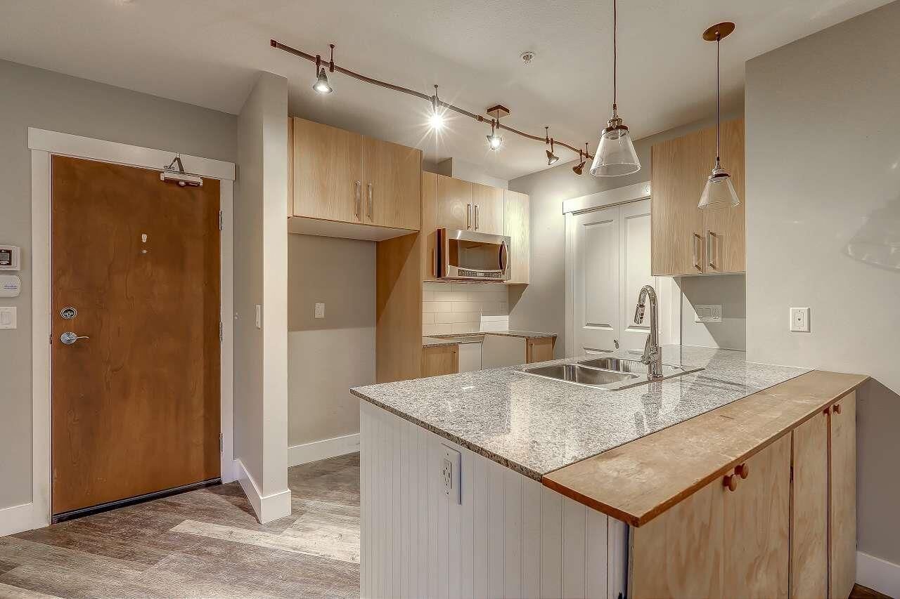 Property Photo: 2943 Nelson Place 107 BC V2S 0C8