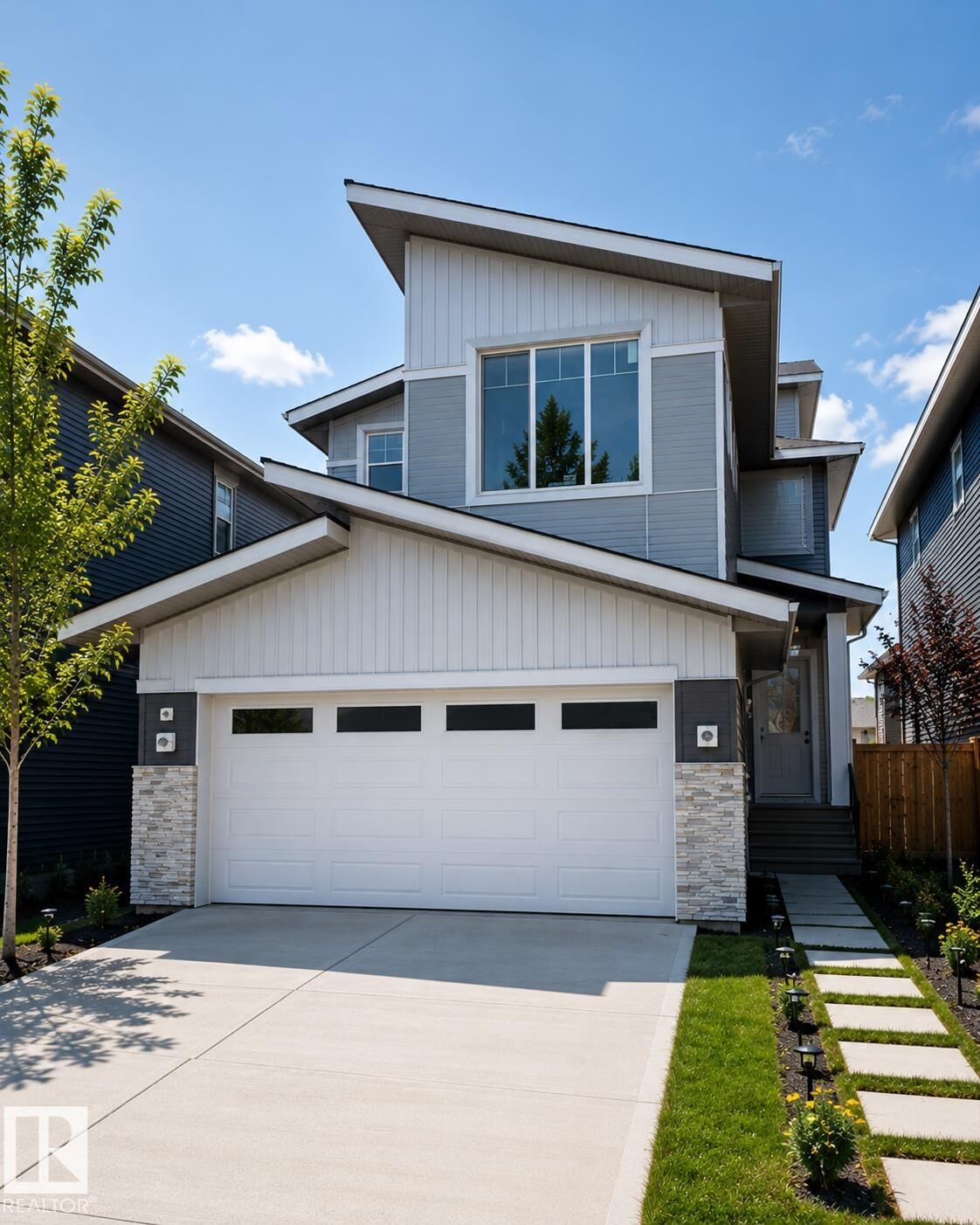 Property Photo: 167 Starling Way AB T8L 1X5