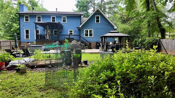 Property Photo: 5168 Hidden Hills Trace GA 30088