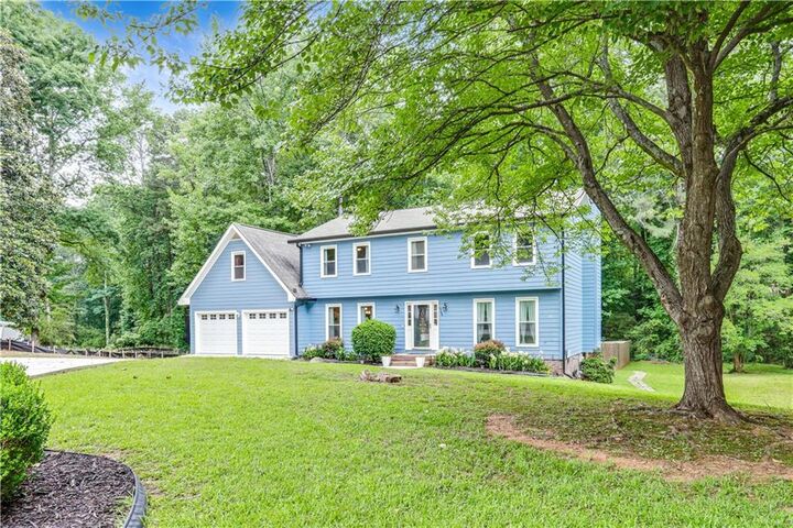 Property Photo:  5168 Hidden Hills Trace  GA 30088 