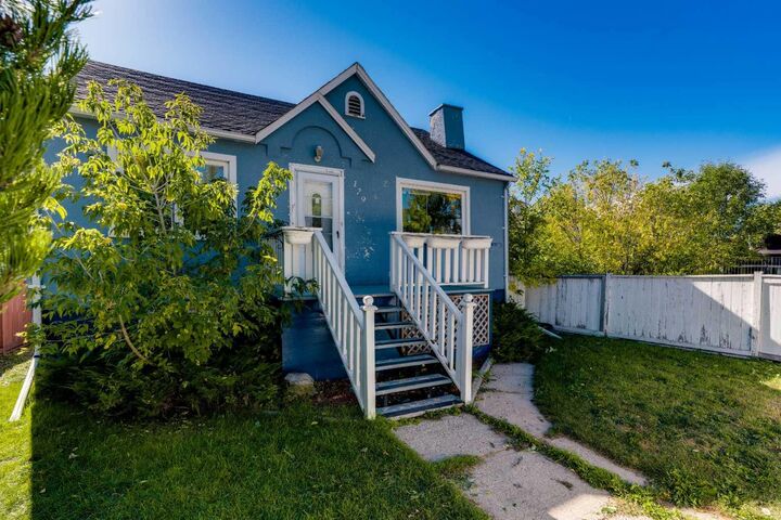 Property Photo: 129 18 Avenue NW AB T2M 0S9