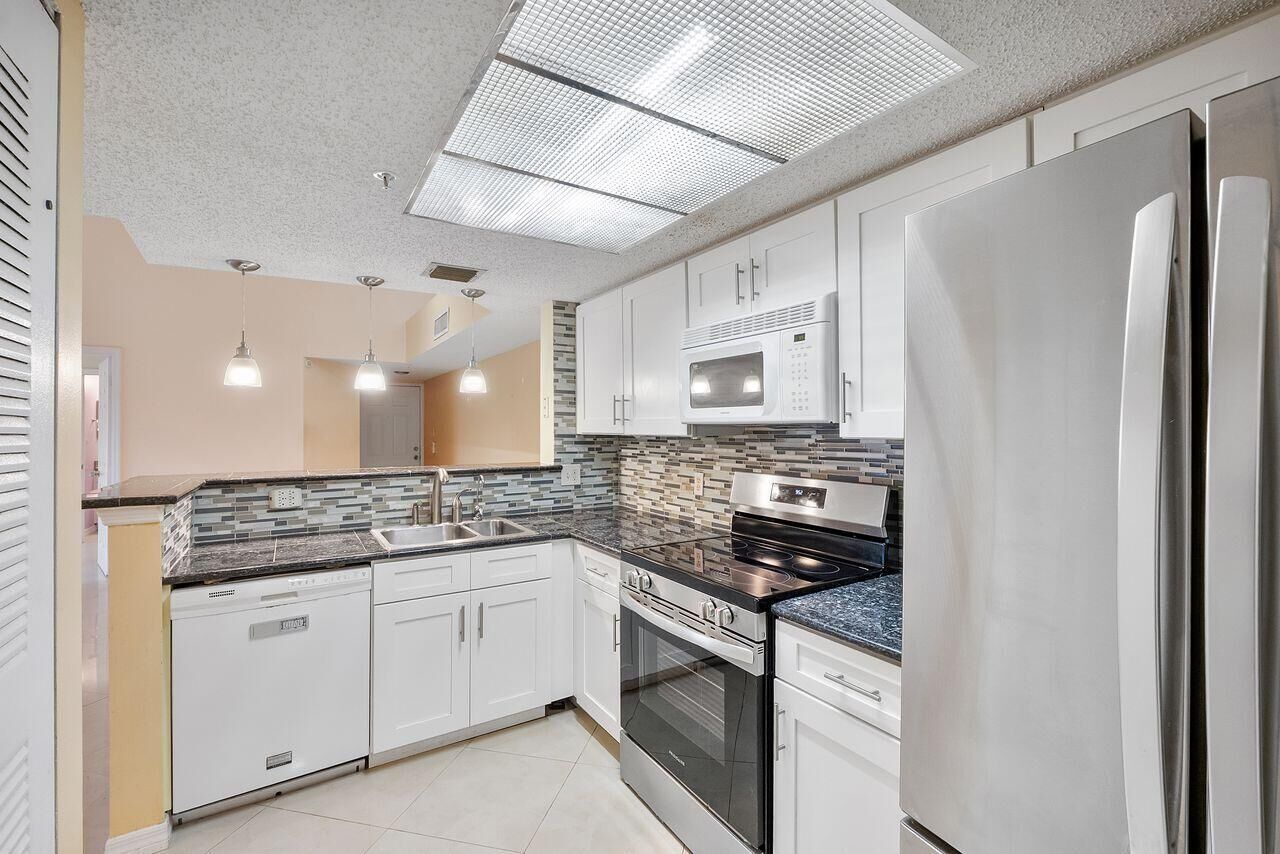 Property Photo: 5011 Wiles Road Unit 303 FL 33073