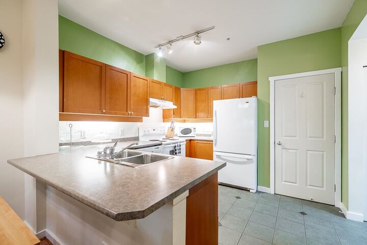 Property Photo: 18 Jack Mahony Place 135 BC V3L 5V8