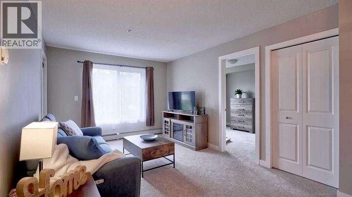 Property Photo:  403 Mackenzie Way Southwest  AB T4B 3V7 