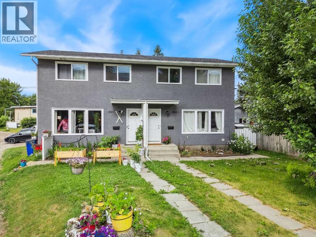 Property Photo:  38153817 43 Street Southwest  AB T3E 3P8 