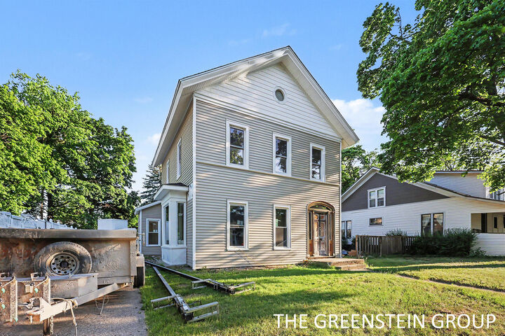 Property Photo: 215 W Grove Street MI 48838