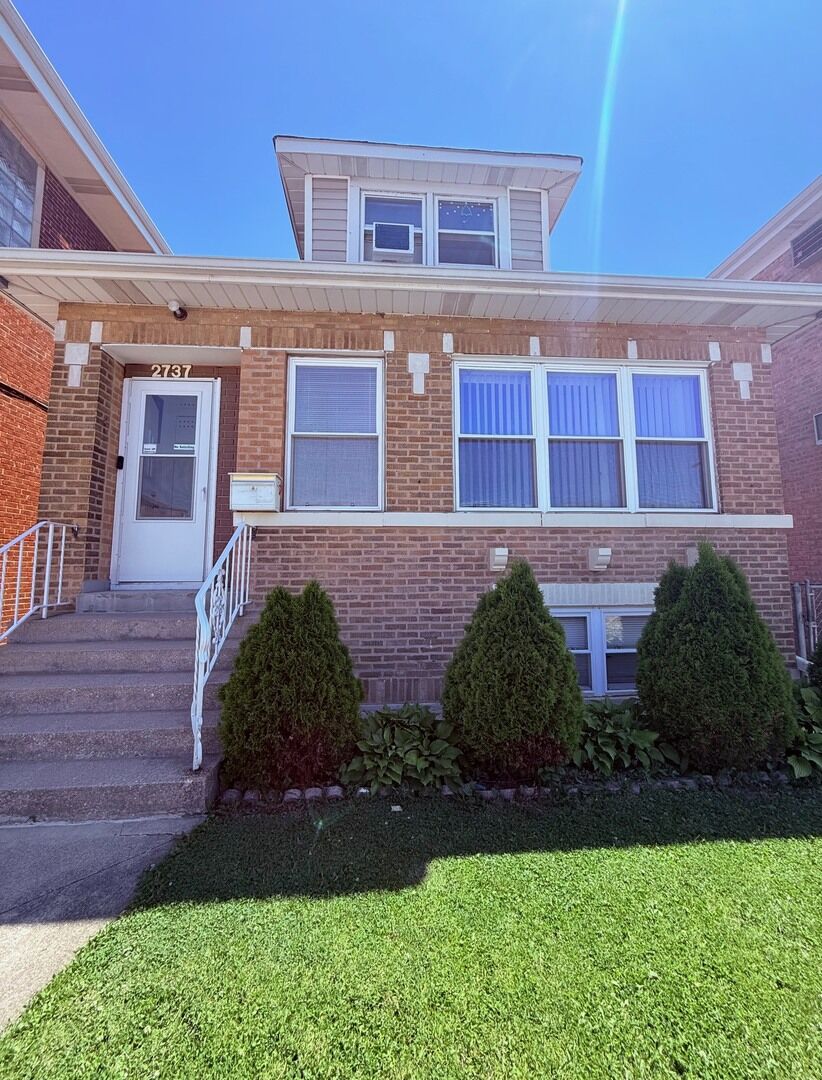 Property Photo:  2737 N 73rd Avenue  IL 60707 