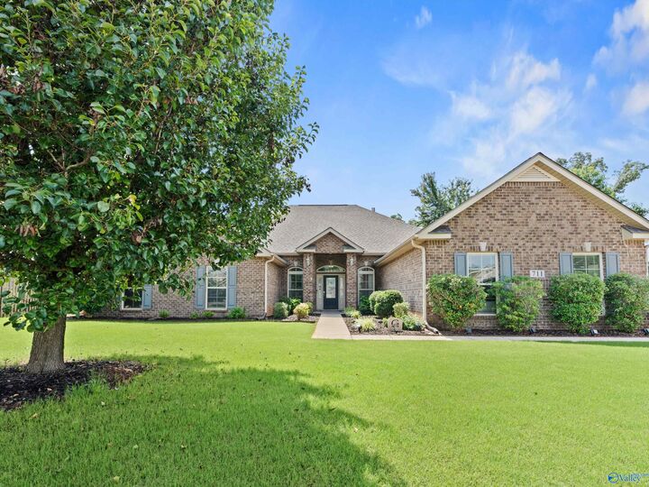 Property Photo: 711 Tide Creek Drive SW AL 35756