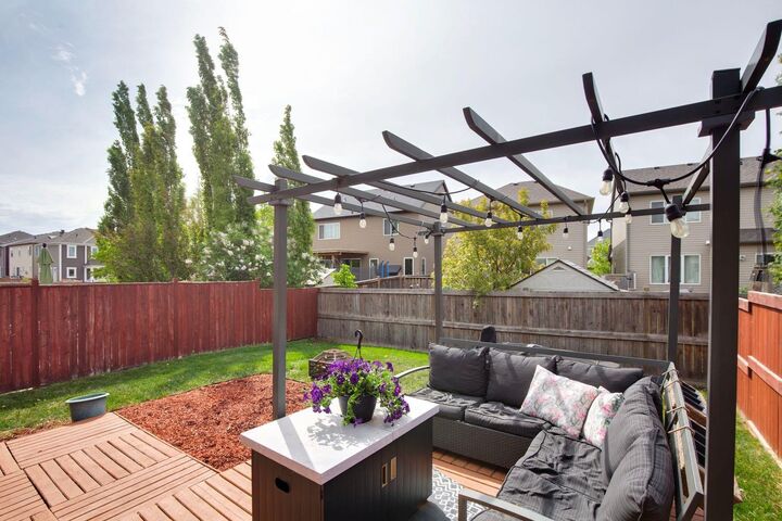 Property Photo: 943 Windsong Drive SW AB T4B 0N5