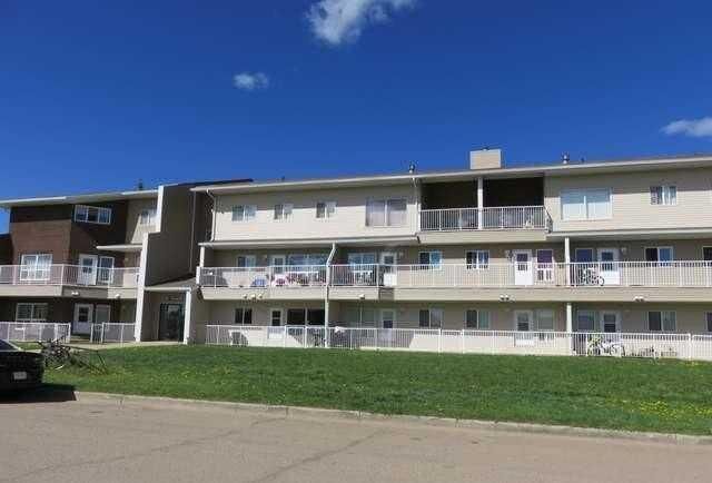 Property Photo:  201 12 Avenue SW 301  AB T0G 2A4 