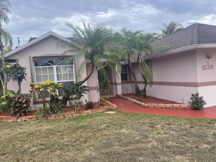 Property Photo:  1538 SW Neptune Avenue  FL 34953 