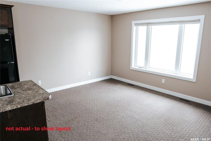 Property Photo: 137 St John Street N SK S4R 2V8