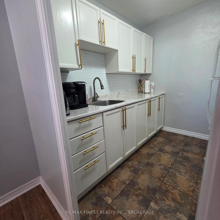 Property Photo: 1 Mowat Avenue 106 ON K7M 1J8