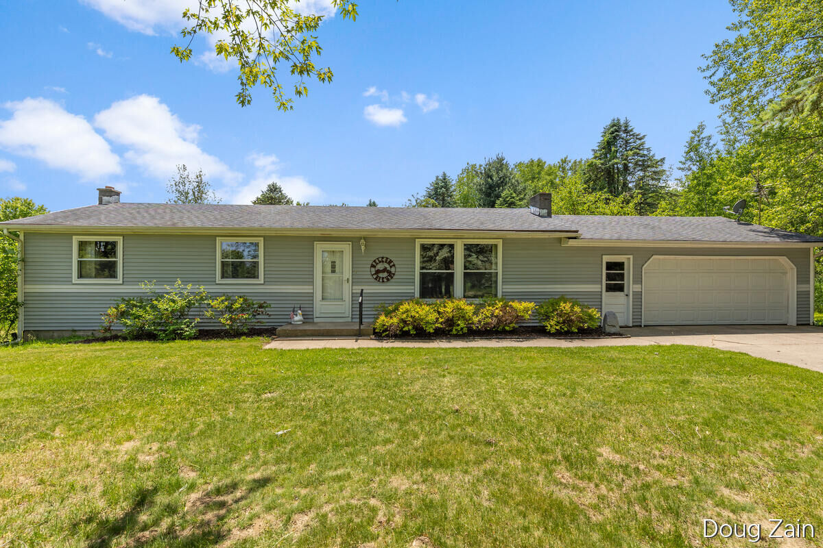 Property Photo:  9090 11 Mile Road NE  MI 49341 