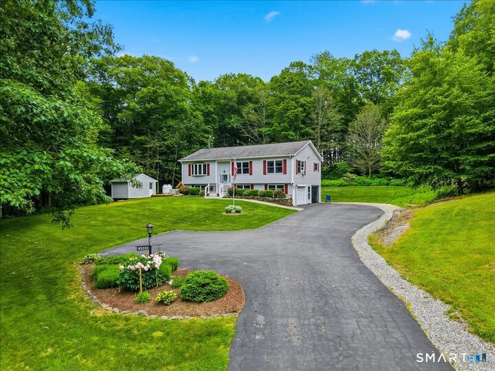 Property Photo:  86-F Whippoorwill Hollow Road  CT 06254 