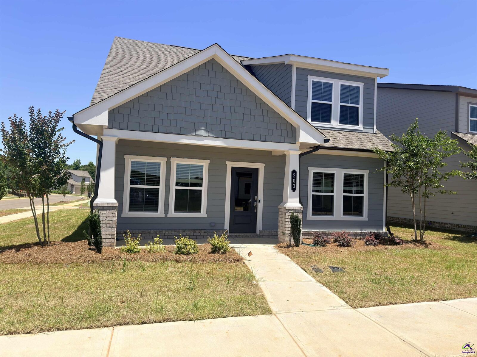Property Photo:  203 Ensemble Boulevard  GA 31069 