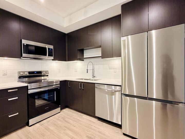 Property Photo:  15733 85th Avenue 418  BC V4N 6W8 