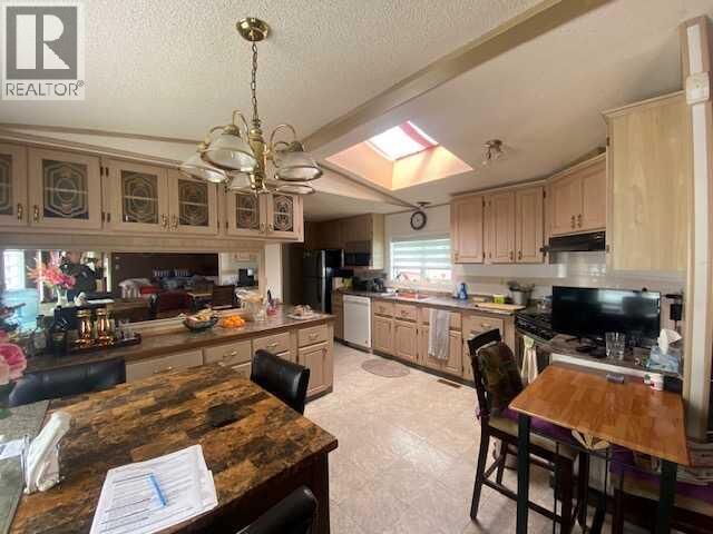 Property Photo:  30 Lake Stafford Crescent East  AB T1R 0P5 