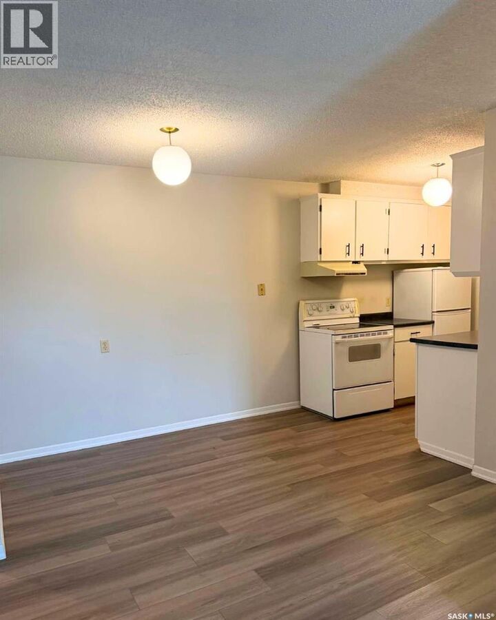 Property Photo:  207 423 Tait Court  SK S7L 7H5 