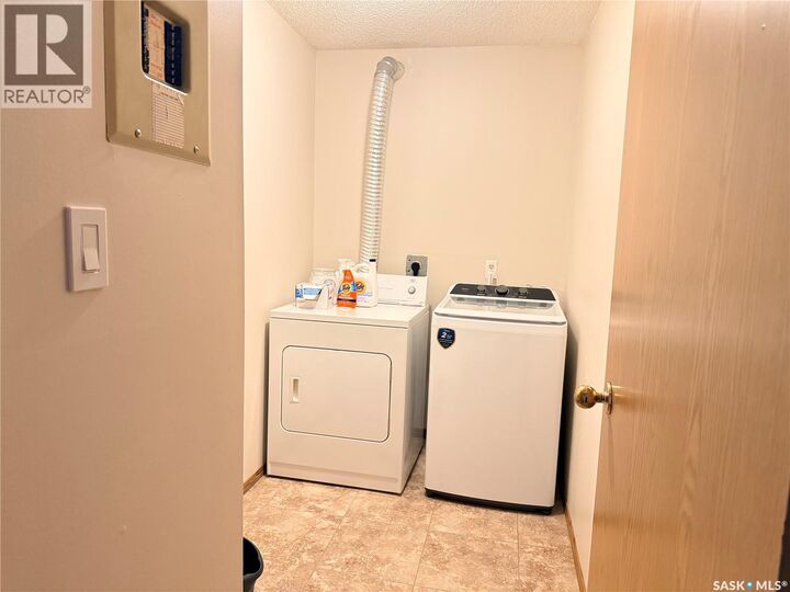 Property Photo:  201 51 Wood Lily Drive  SK S6J 1H1 