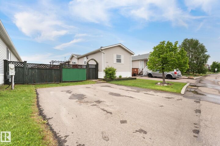 Property Photo:  1592 Jubilee Drive  AB T8H 2M9 