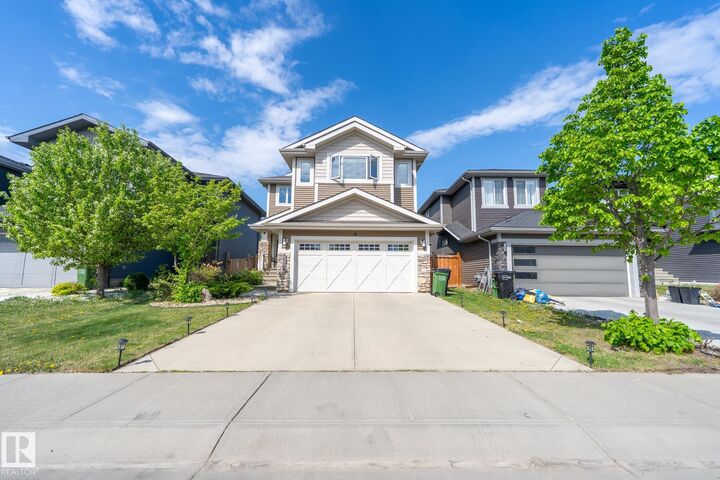 Property Photo:  8508 219 Street NW  AB T5T 7C9 