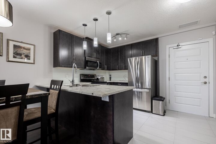 Property Photo:  5151 Windermere Boulevard SW 310  AB T6W 2K4 