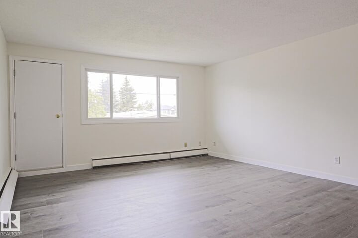 Property Photo:  14903 92 Avenue NW 205  AB T5R 5B5 
